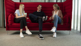 Three people on a couch